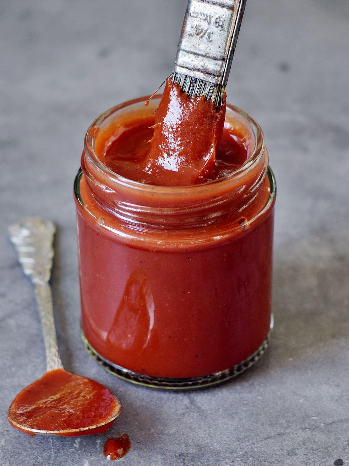 homemade vegan keto bbq sauce in jar with brush