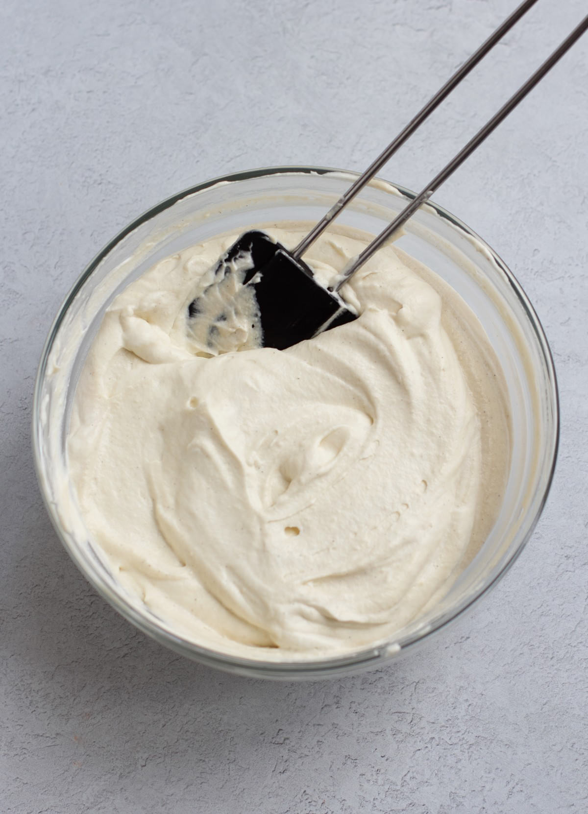 coconut whipped cream and cashew cream combined in bowl