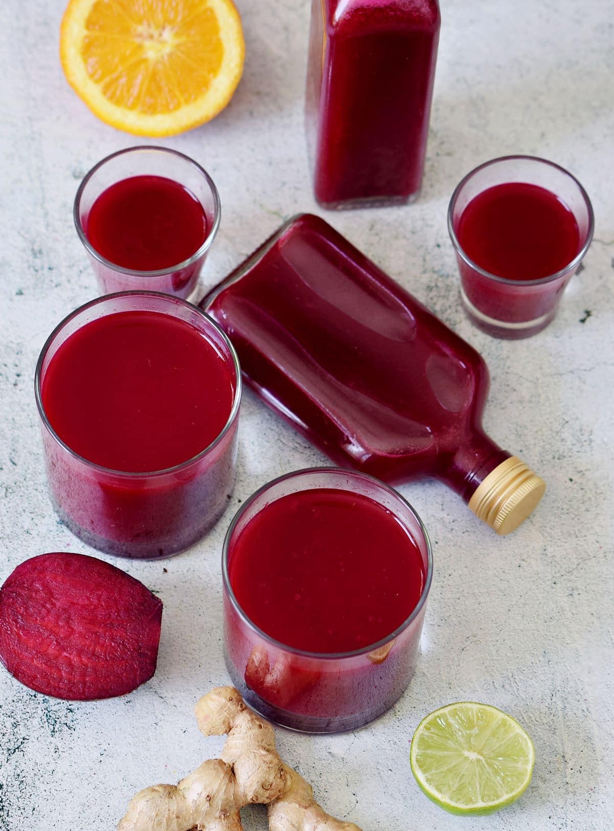 beetroot juice in jars and bottles from above