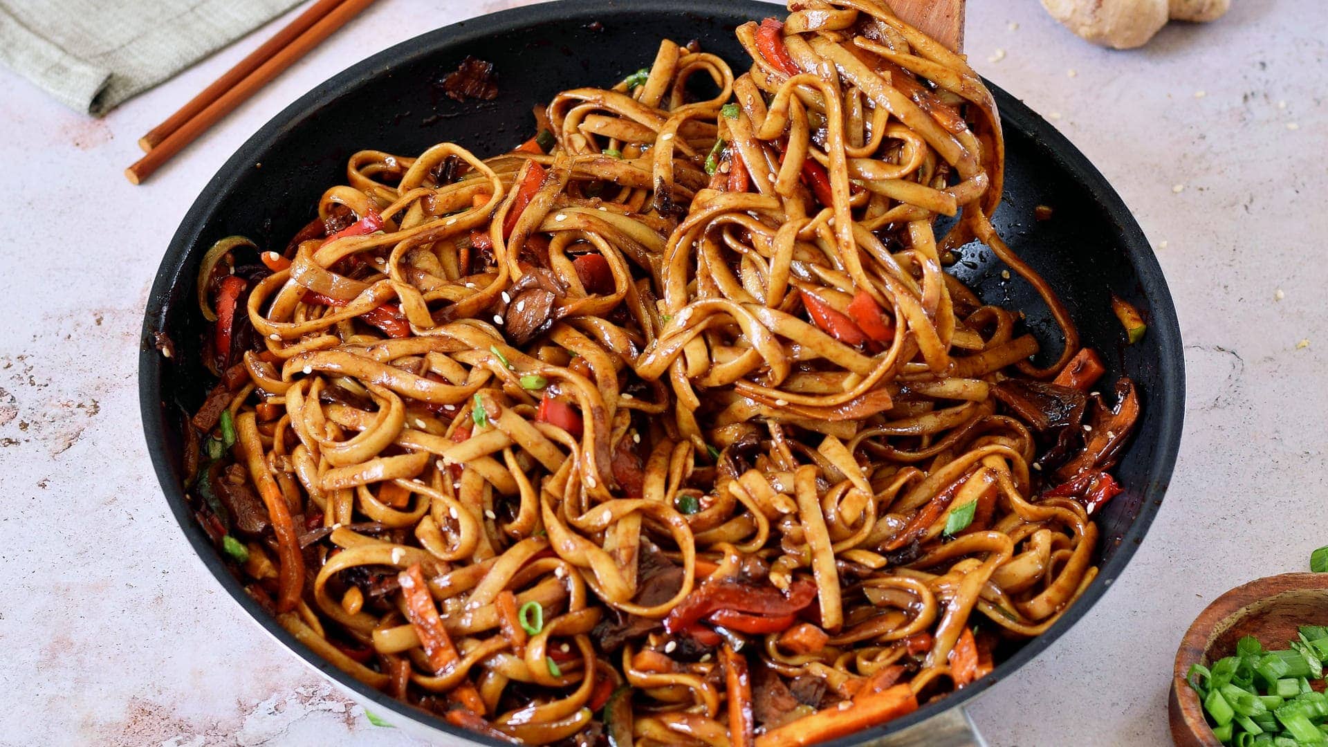 landscape photo of asian noodle stir fry with vegetables Asian vegetarian noodle dish