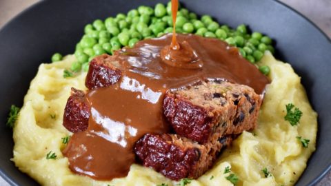 black bean meatloaf with vegan mash, gravy, and peas