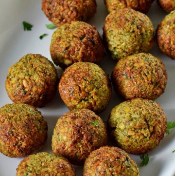 close-up of air fryer falafel on white plate