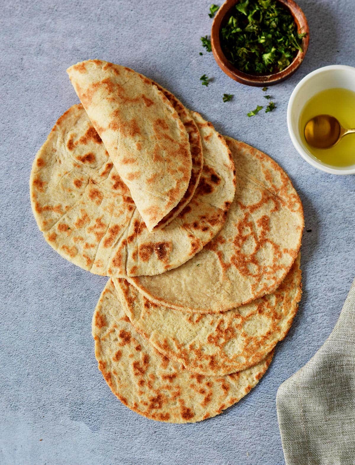 5 keto almond flour tortillas with one folded over