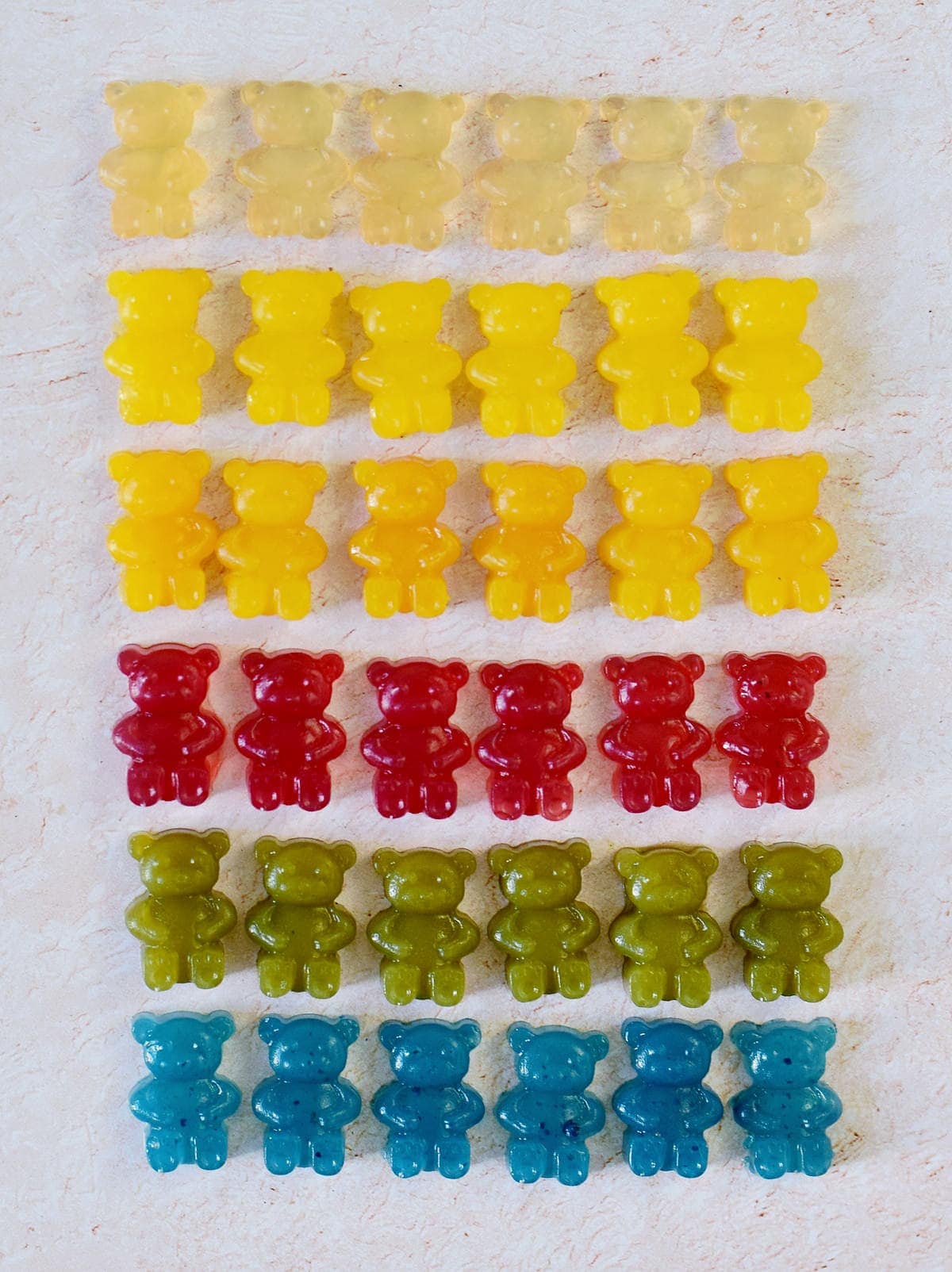 vegan gummy bears in 6 different colors in several rows