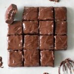 15 square no bake brownies one with bite marks