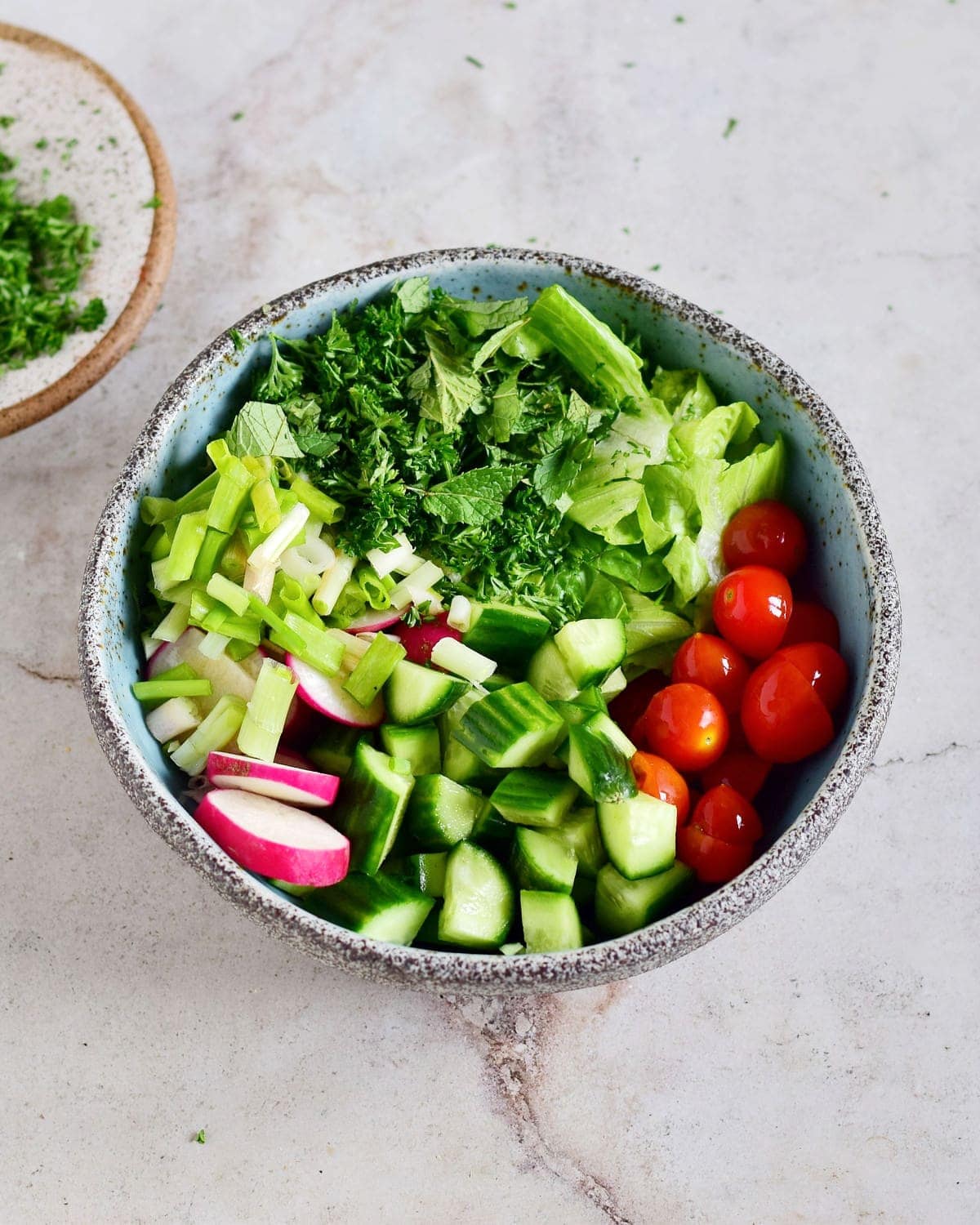 chopped salad veggies in bowl