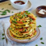pajeon - Korean scallion pancake stack on small plate
