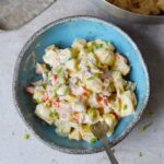 vegan potato salad in blue bowl