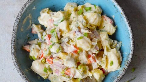 vegan potato salad in blue bowl