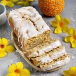 fresh pineapple bread with sugar-free icing and yellow flowers as decoration