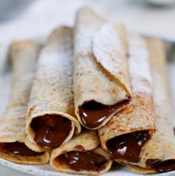 cropped-horizontal-shot-of-6-gluten-free-crepes-with-chocolate-spread-on-plate.jpg
