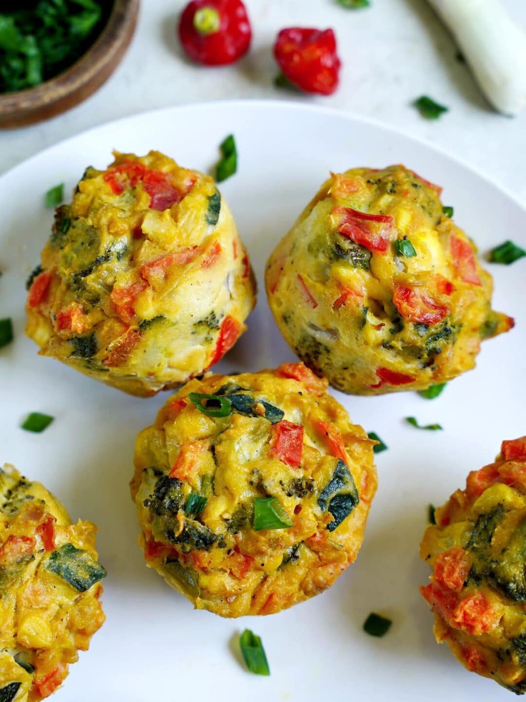 close-up of savory muffins on white plate