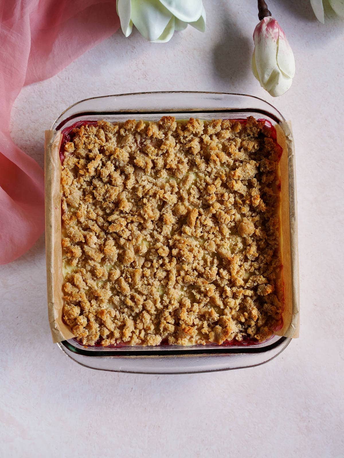 baked crumble cake in glass pan