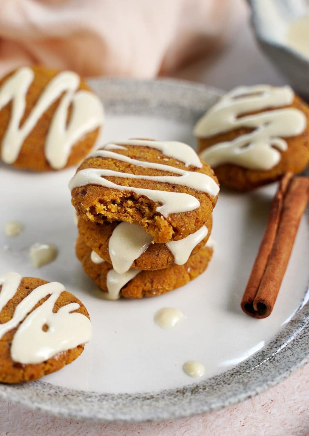 stack of gluten-free pumpkin cookies with icing