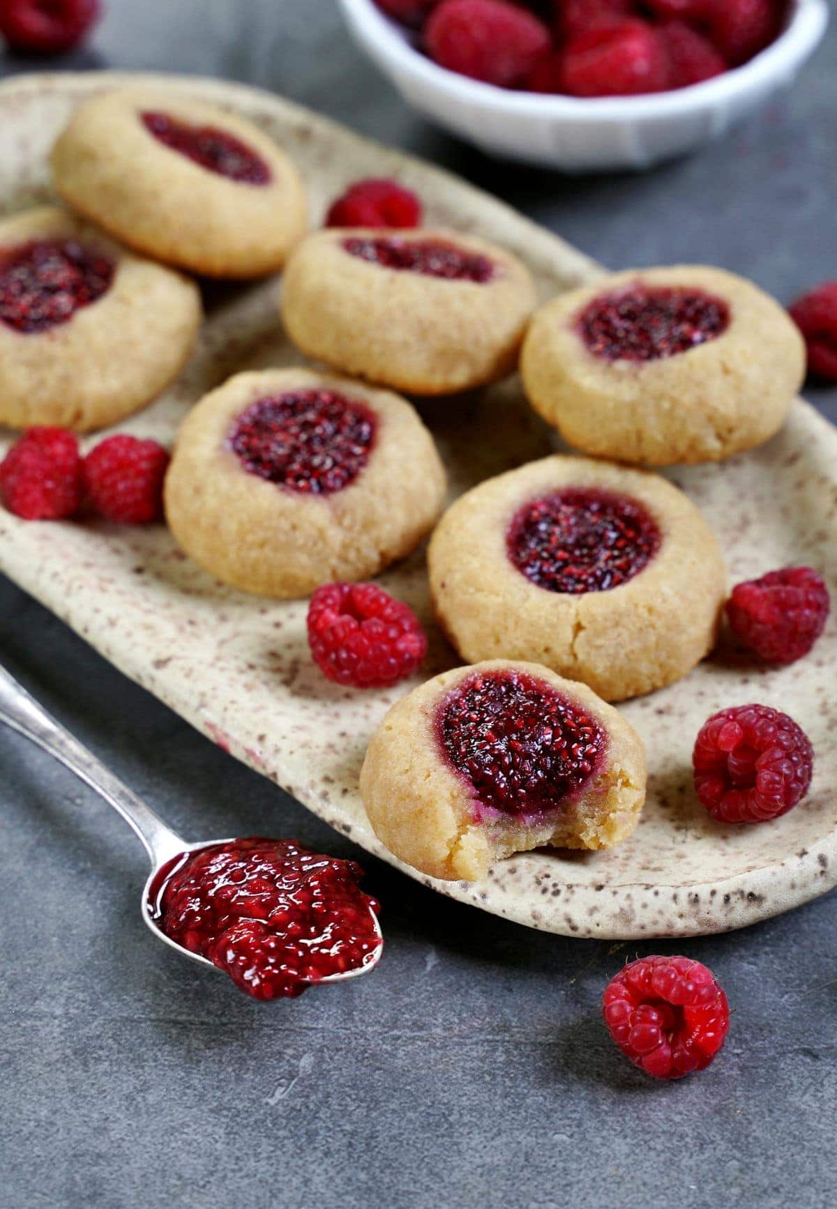 close-up of raspberry thumbprint cookies