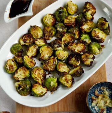 cropped-crispy-garlic-Brussels-sprouts-on-white-plate.jpg