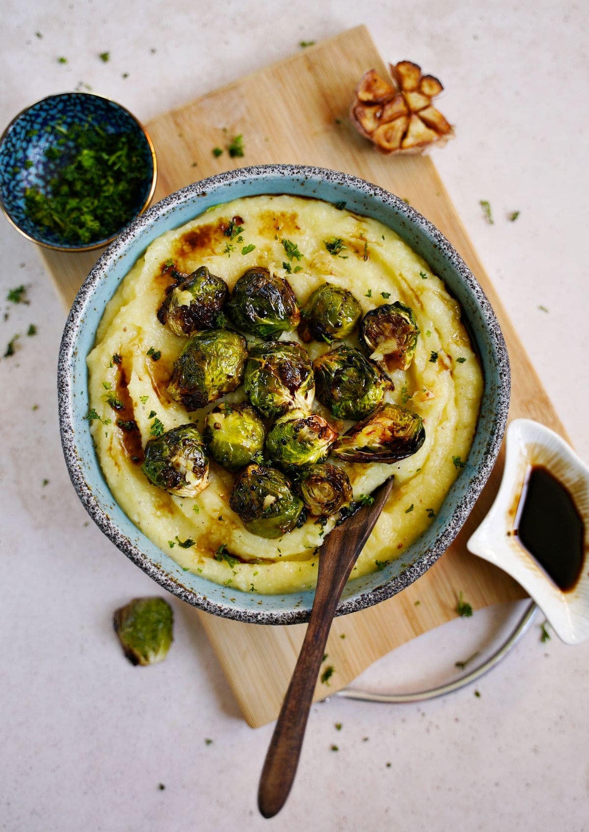 mashed potatoes with roasted Brussels sprouts in bowl