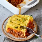 a piece of vegan Shepherds pie on a small plate
