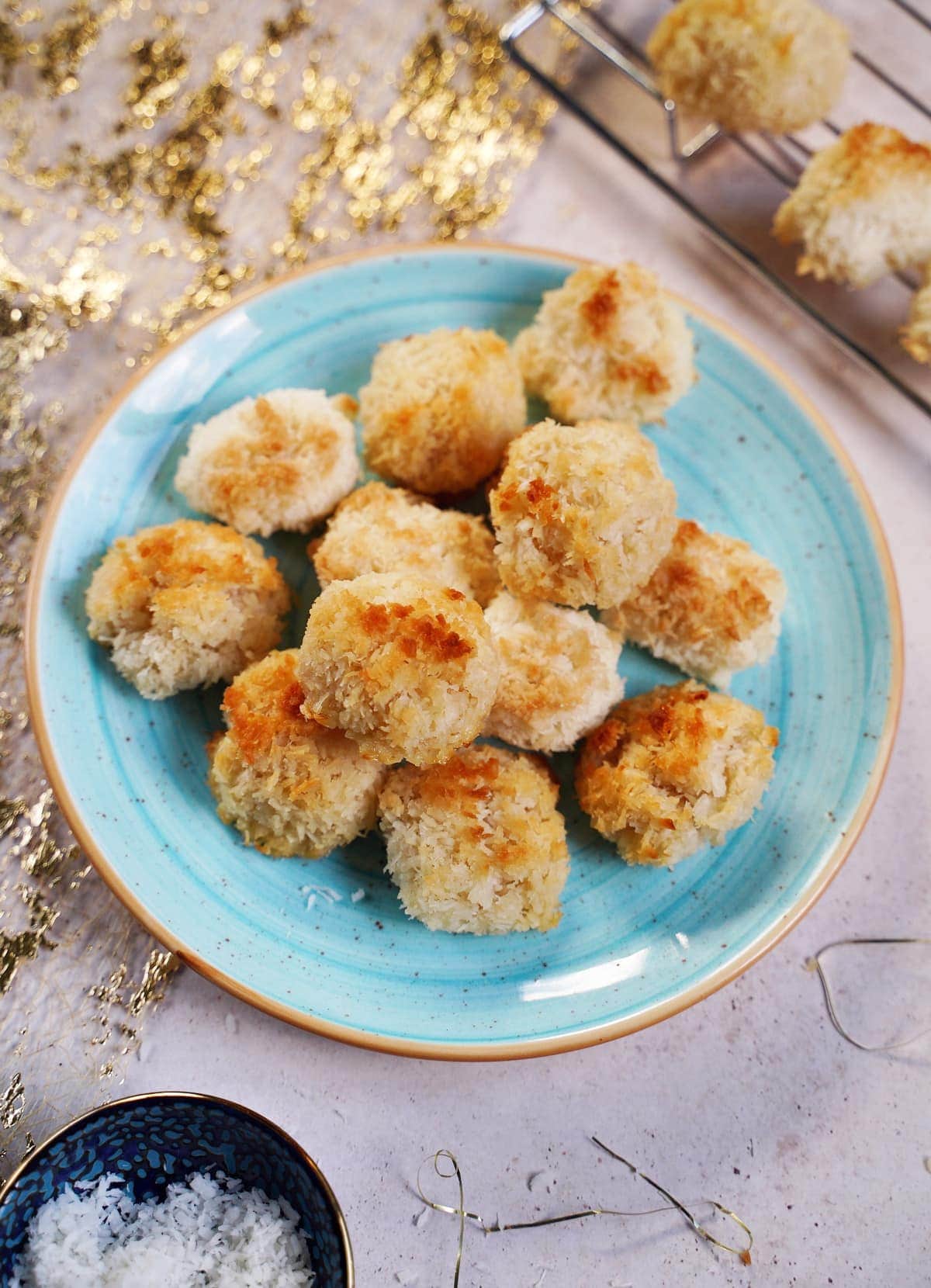 baked coconut macaroons on blue plate