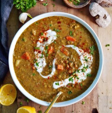 cropped-creamy-vegan-lentil-soup-in-bowl-with-coconut-cream-and-spoon.jpg
