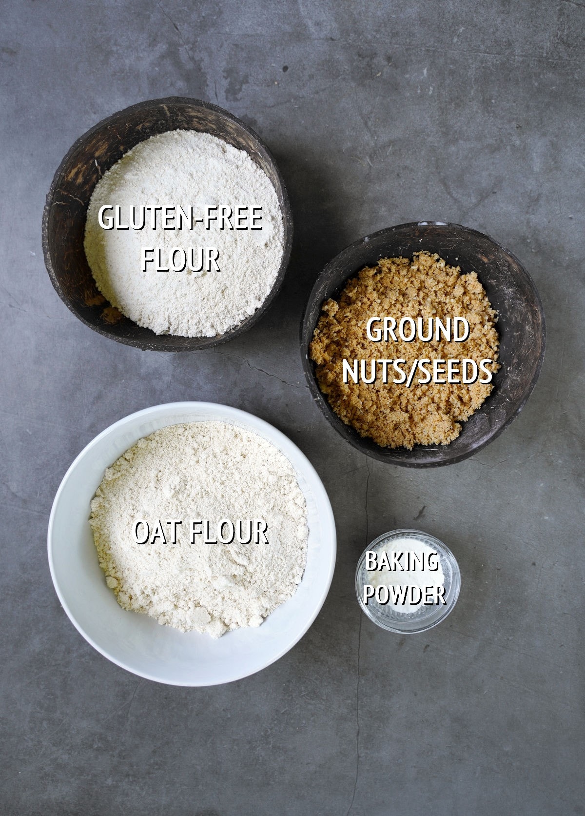 dry ingredients with labels on gray backdrop