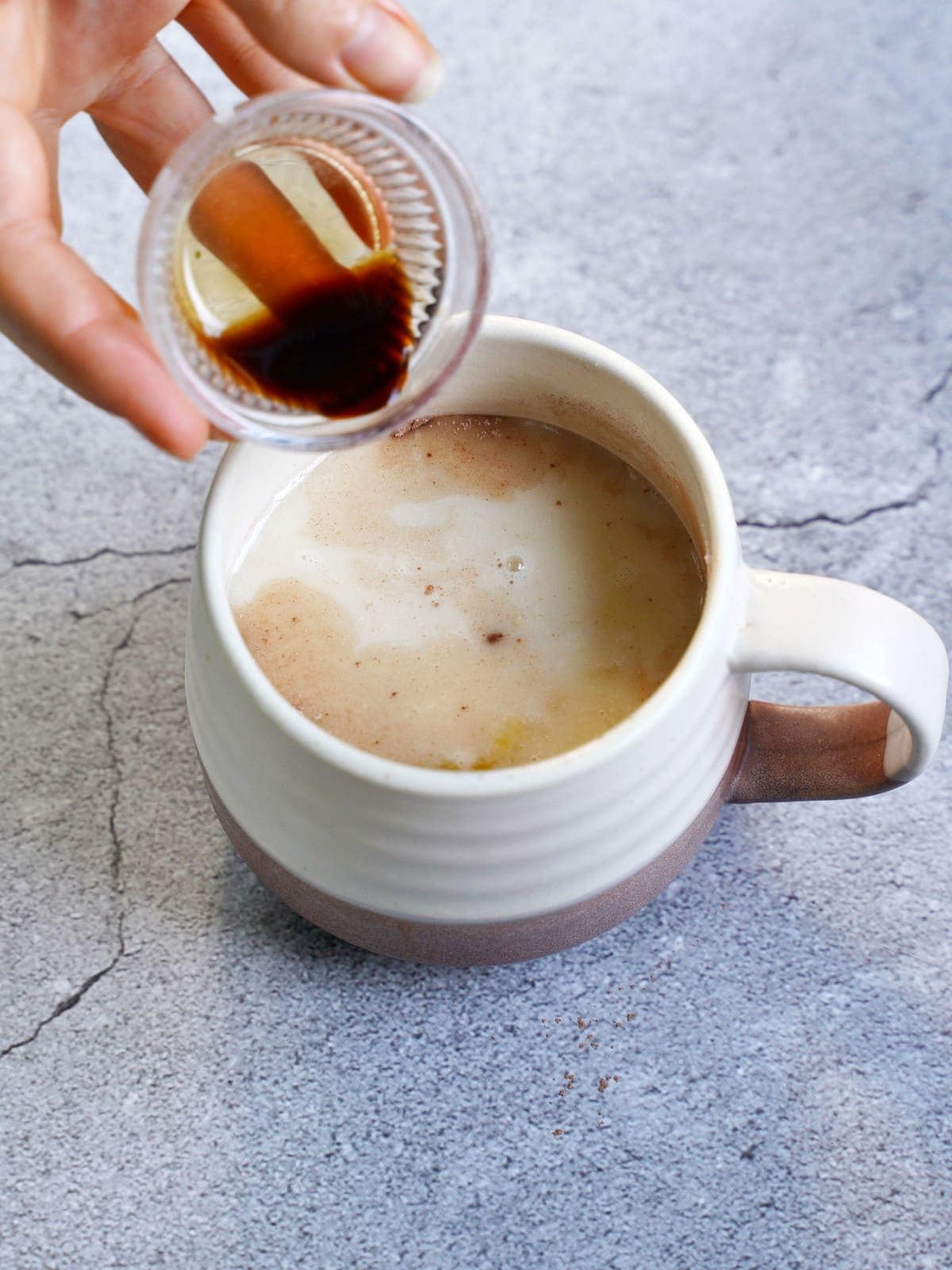 stirring wet ingredients in mug