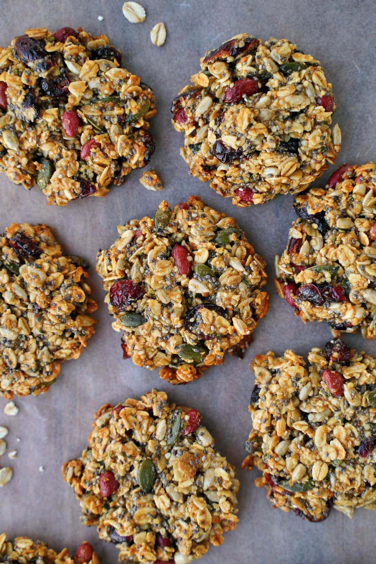 close-up of oat cookies with seeds on wax paper