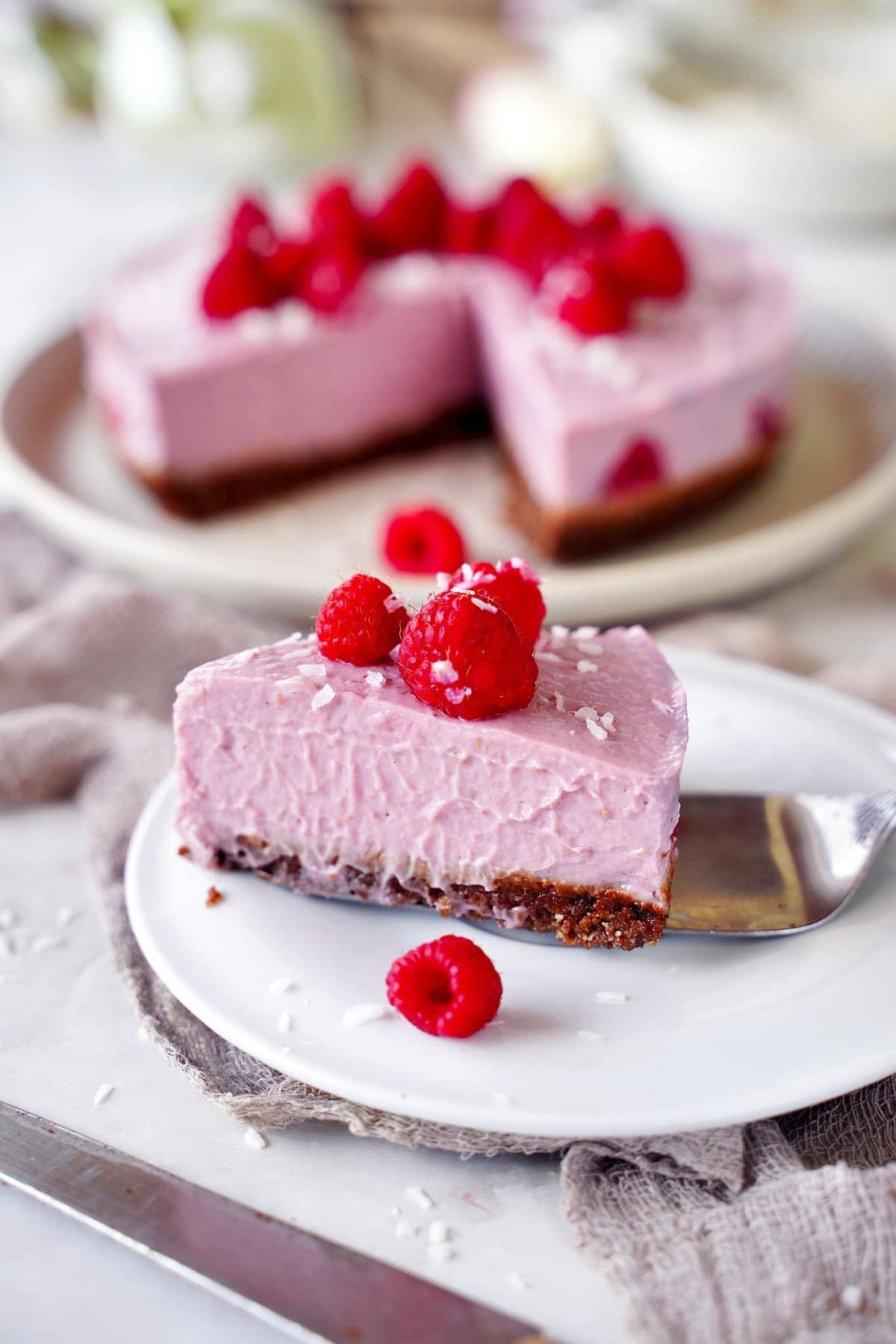 a slice of raspberry cheesecake