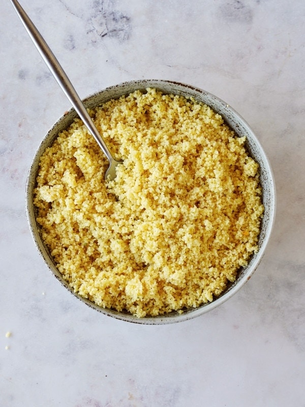 instant cous cous in bowl with fork