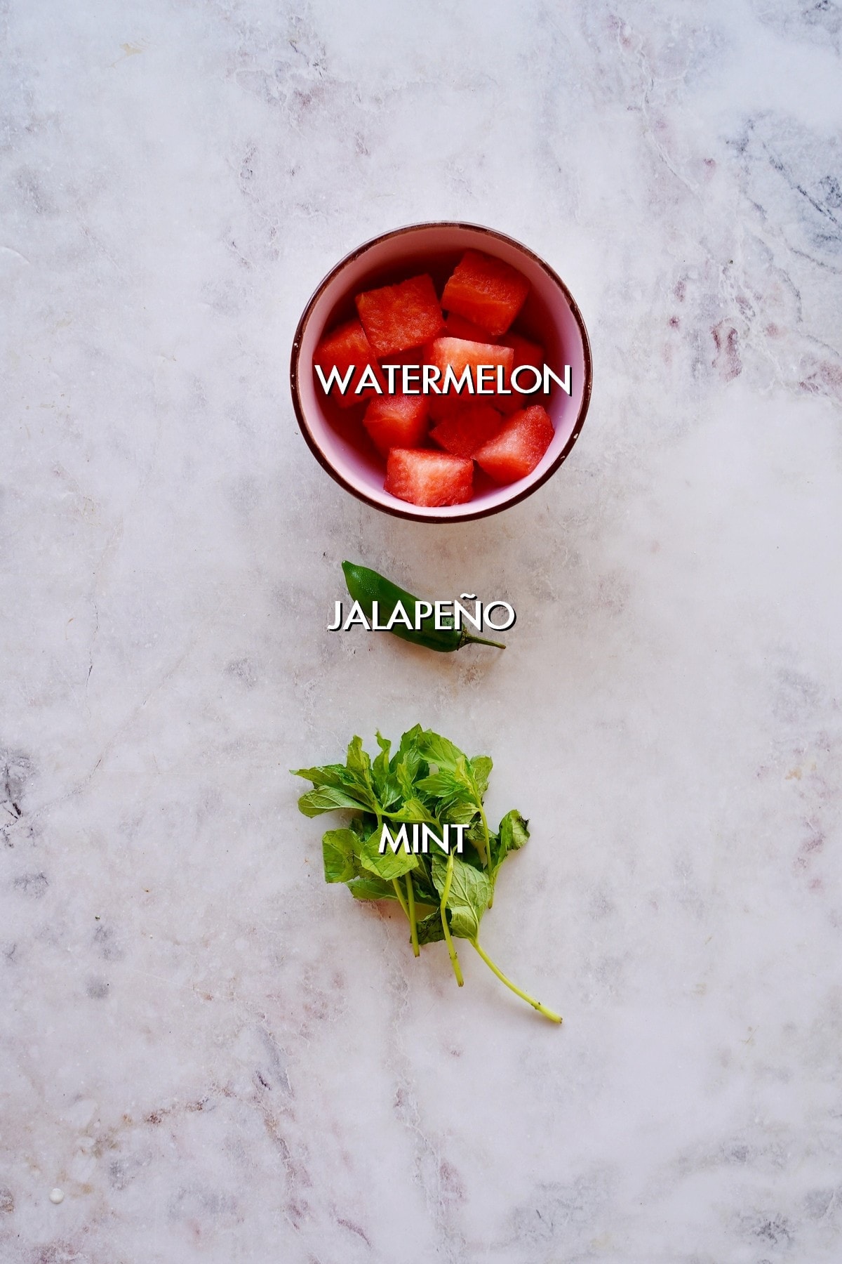 watermelon, jalapeño and mint on white backdrop