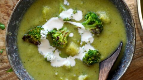 healthy vegan broccoli soup in bowl with spoon