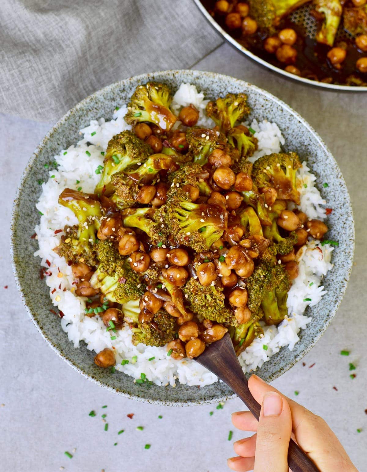 broccoli chickpea stir-fry with rice in bowl