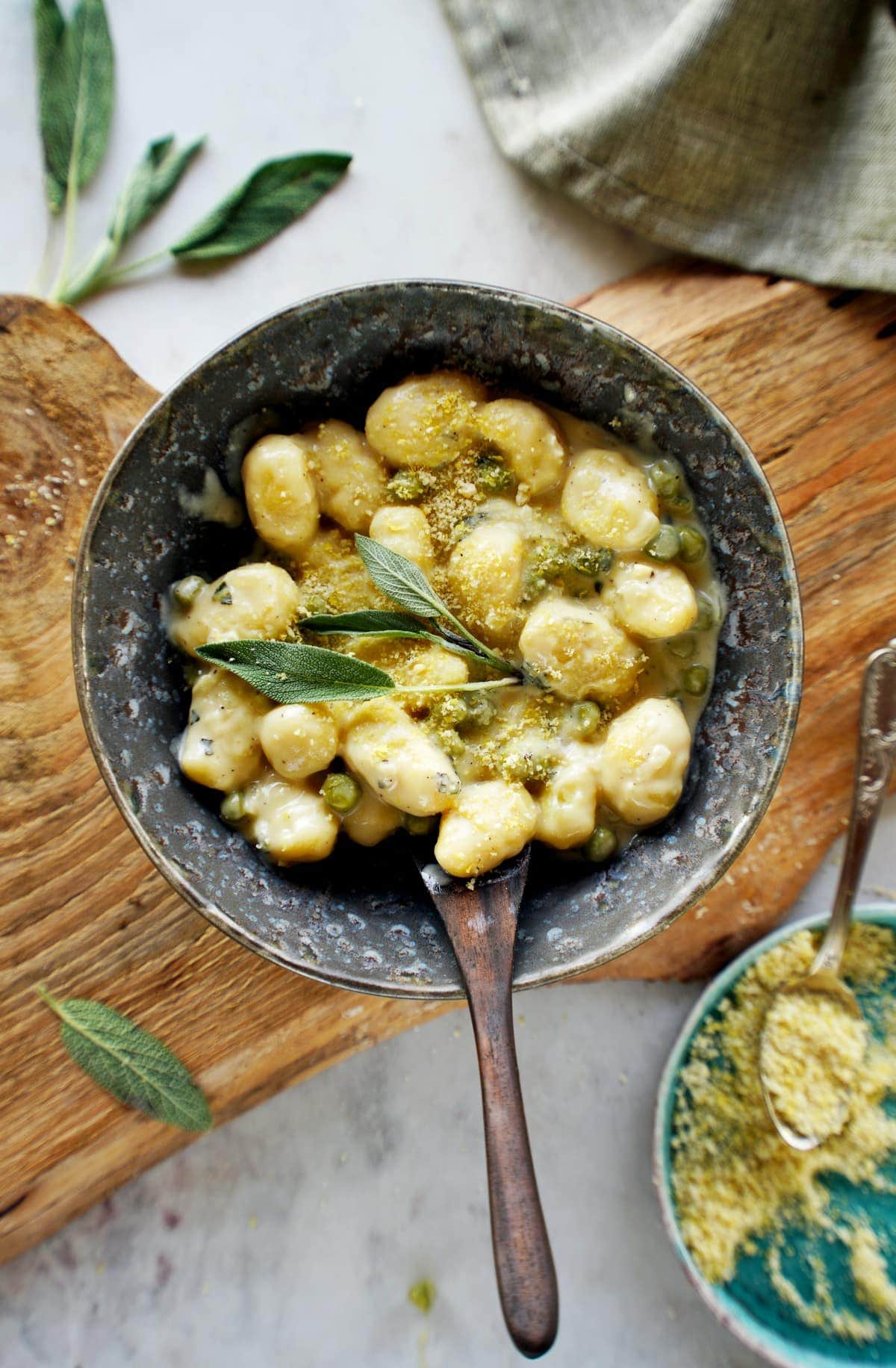 gnocchi with white sauce in bowl