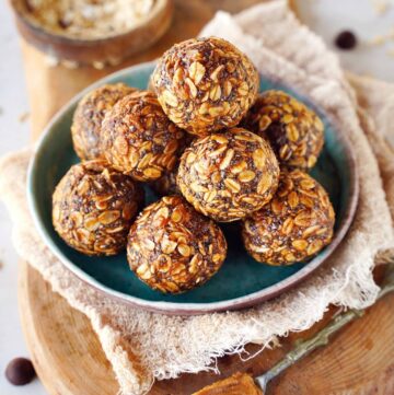 stack of peanut butter oatmeal energy balls on small plate
