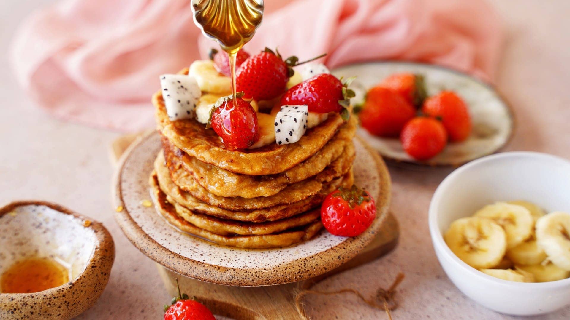 horizontal shot of protein pancakes with fruit