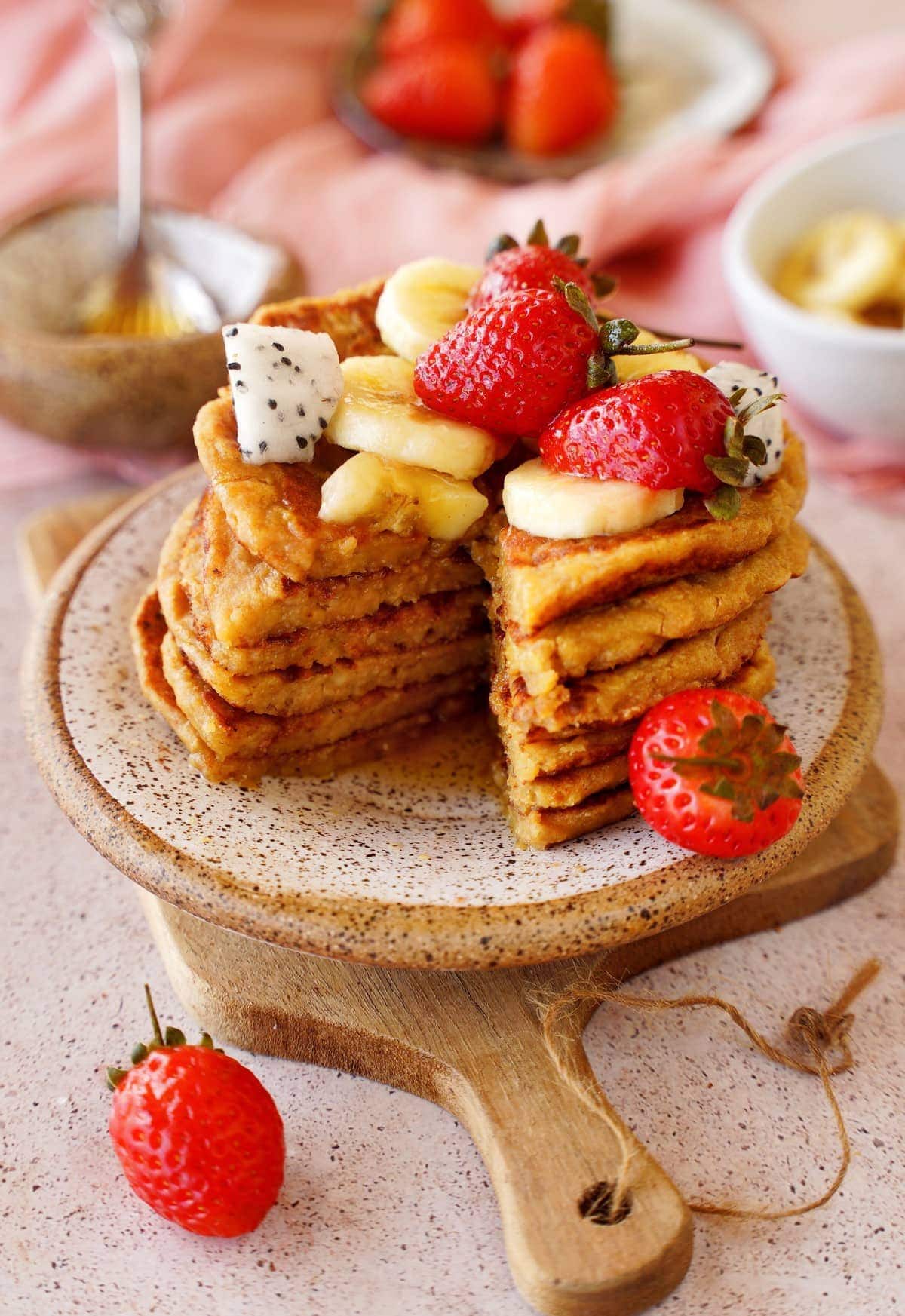 protein pancake stack cut open with fruits