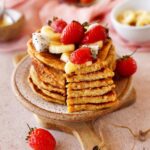 protein pancakes with fruits on small plate