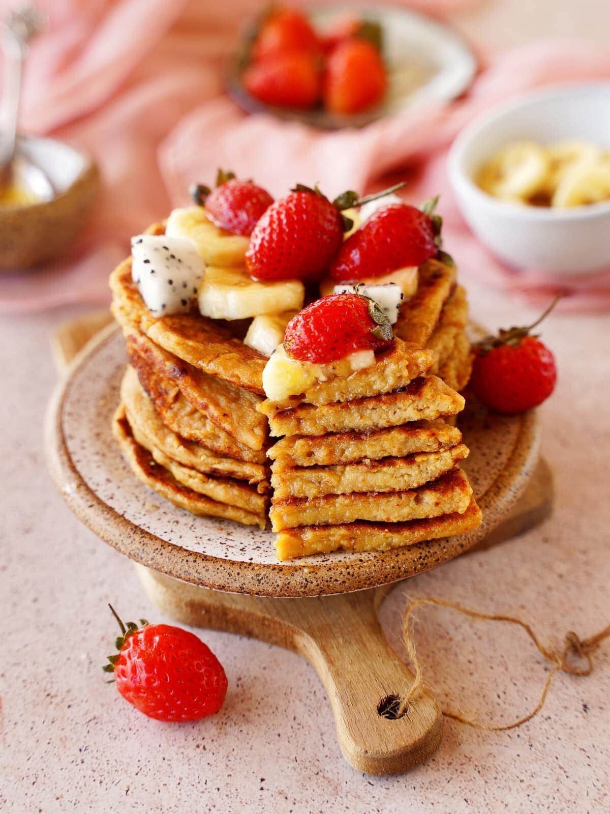 protein pancakes with fruits on small plate