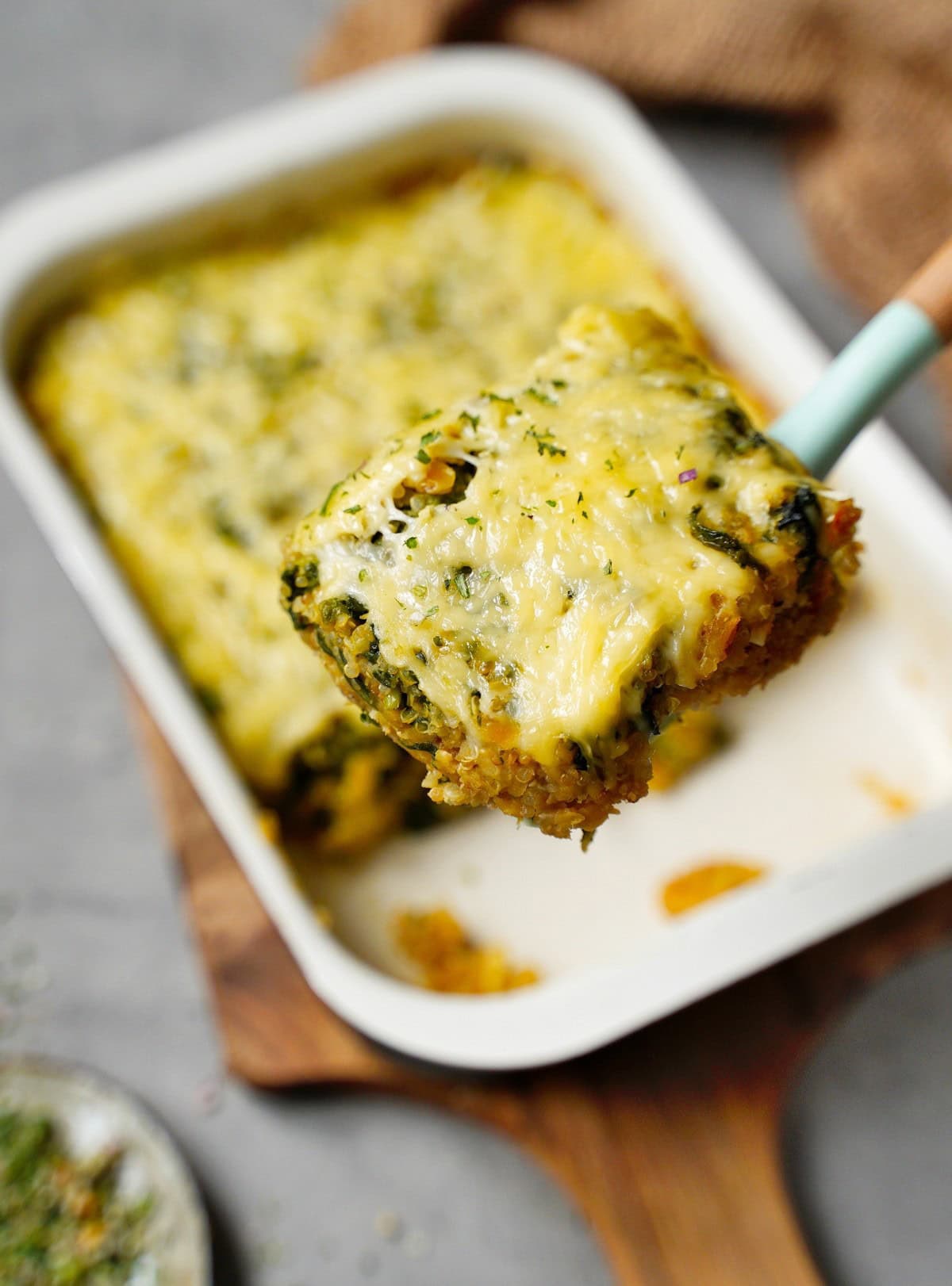 piece of spinach casserole with cheese