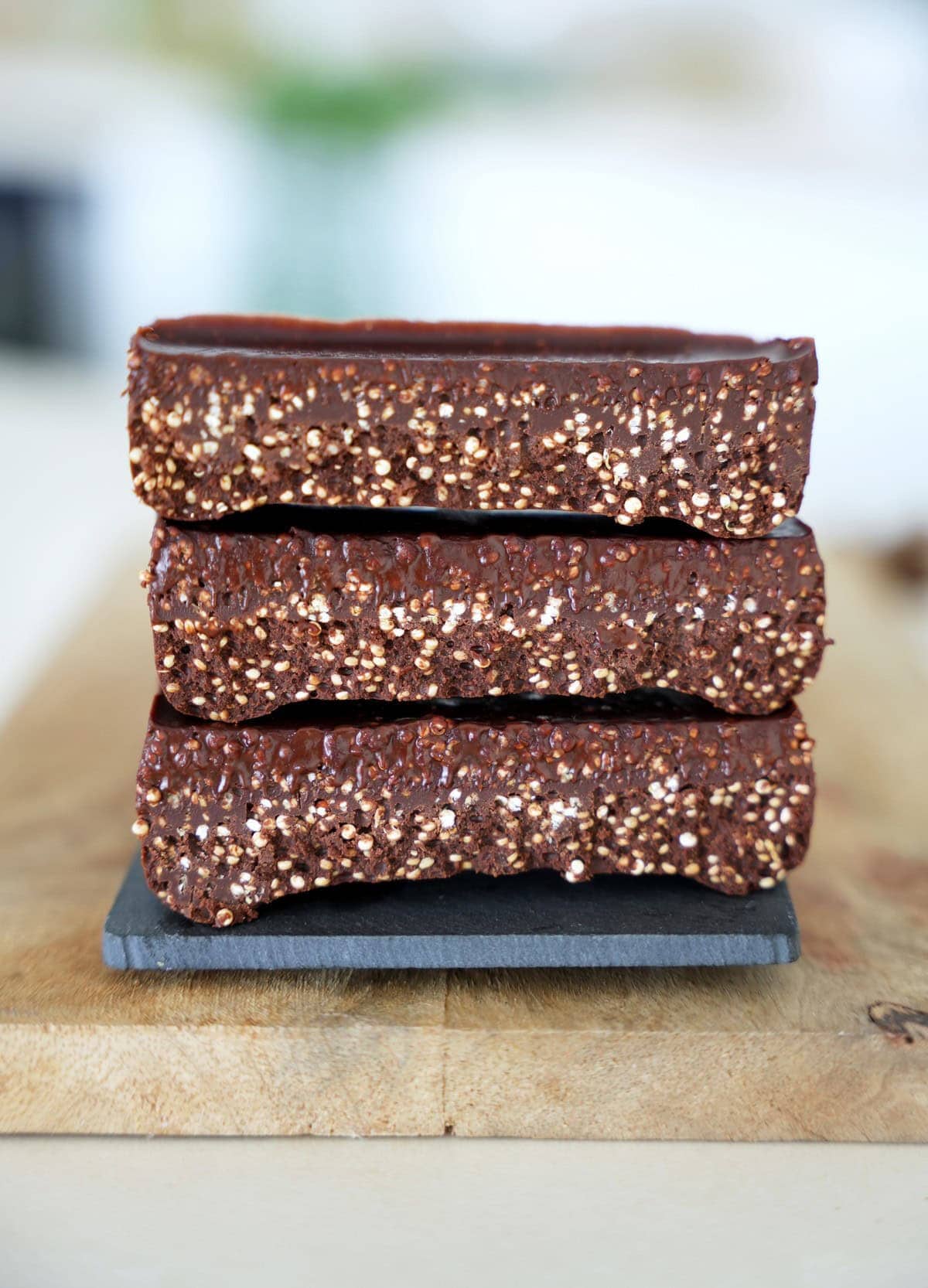 3 stacked quinoa chocolate bars with a crunchy texture