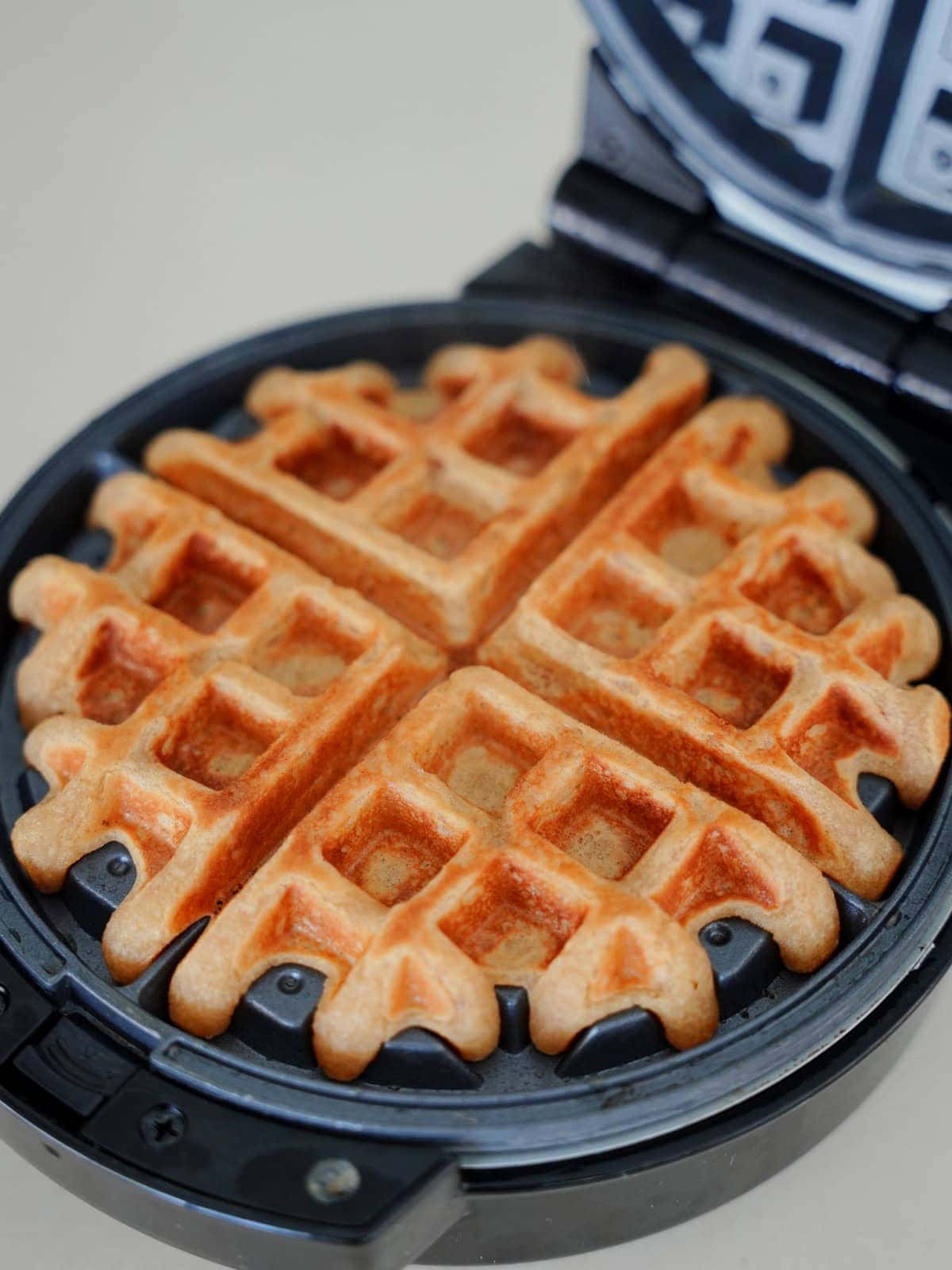 Golden brown waffle cooked in a waffle maker