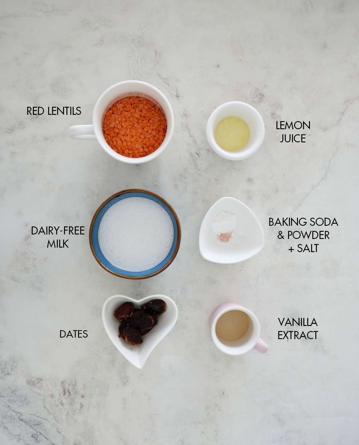 The ingredients for red lentil waffles in various small dishes