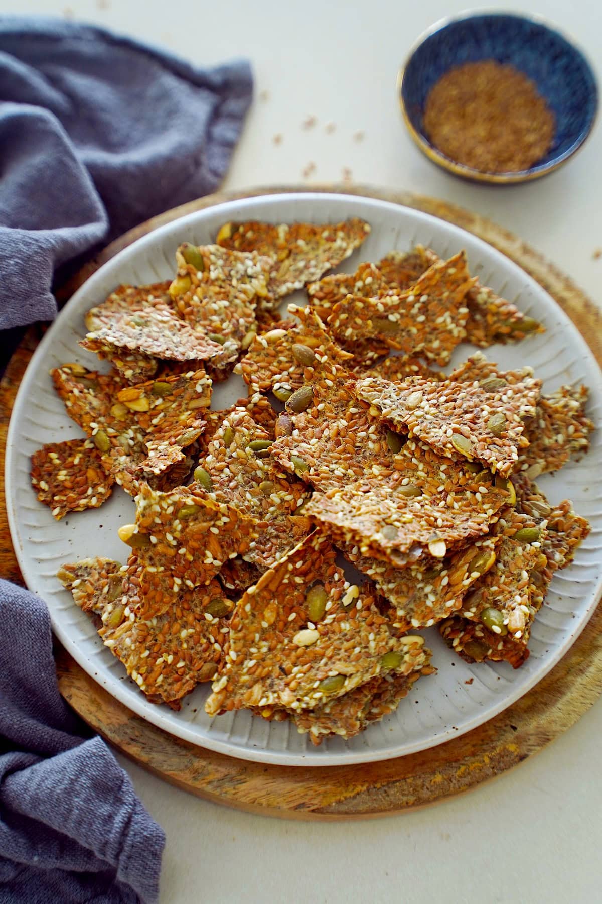 Top shot of a plate with super crispy seed crackers
