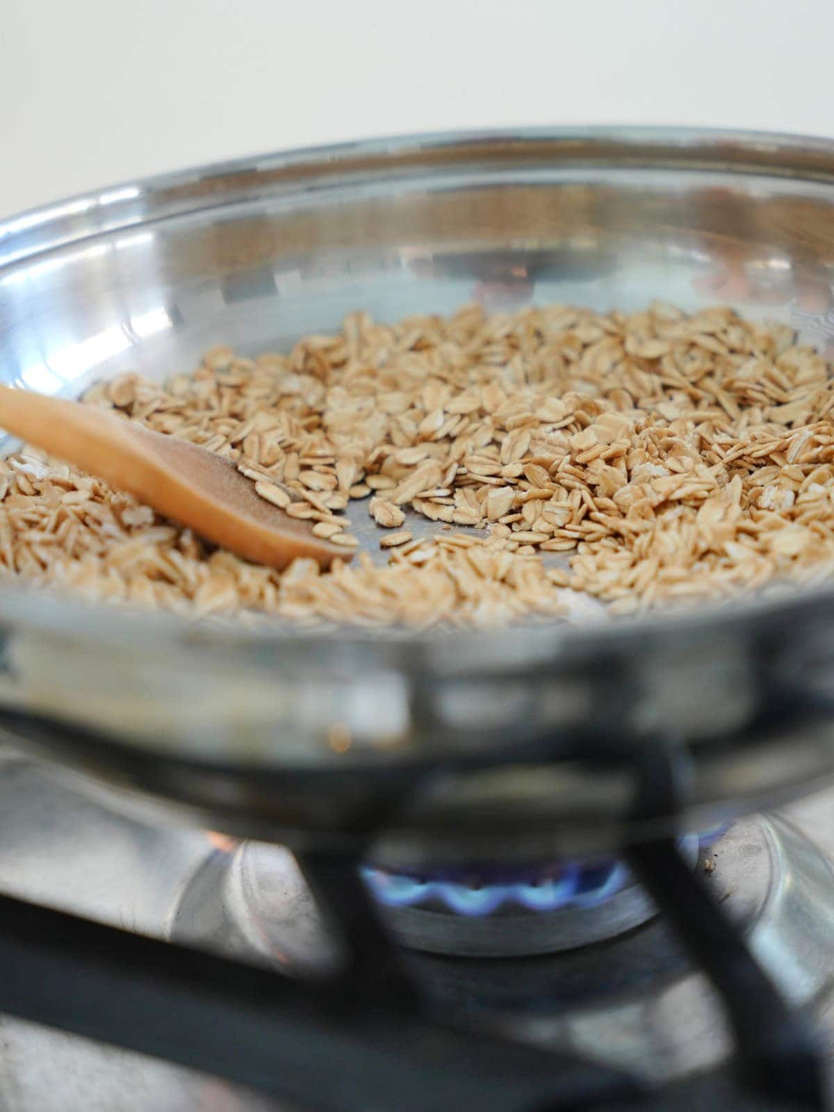 toasting oats in a skillet.