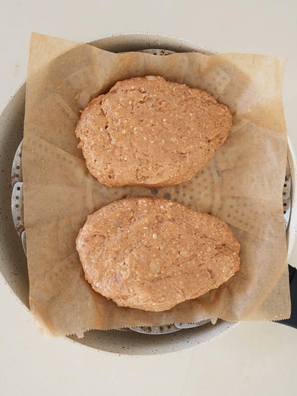 bean steaks on parchment paper before steaming