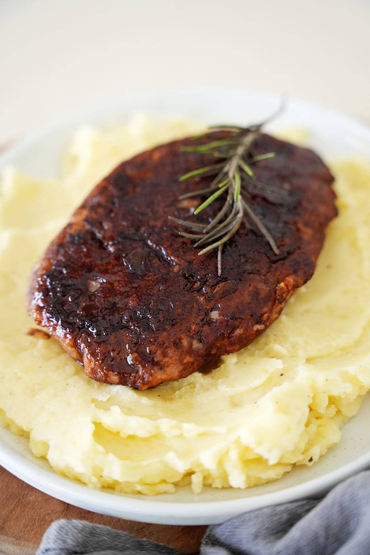 vegan white bean steak on mashed potatoes