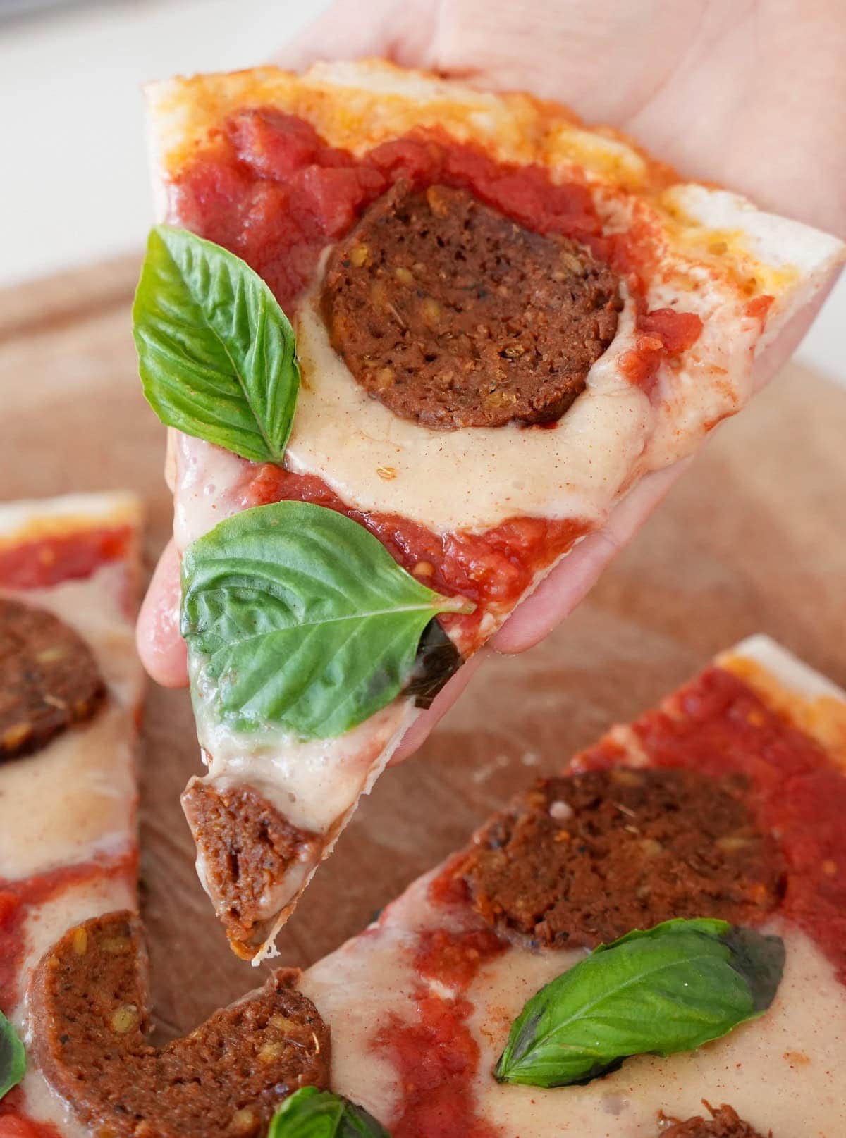A slice of Pizza with homemade vegan pepperoni