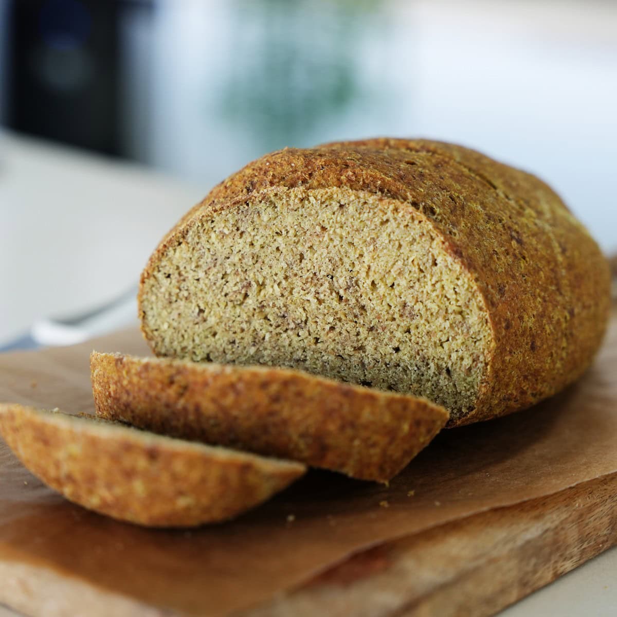 Sliced pea bread on wooden board