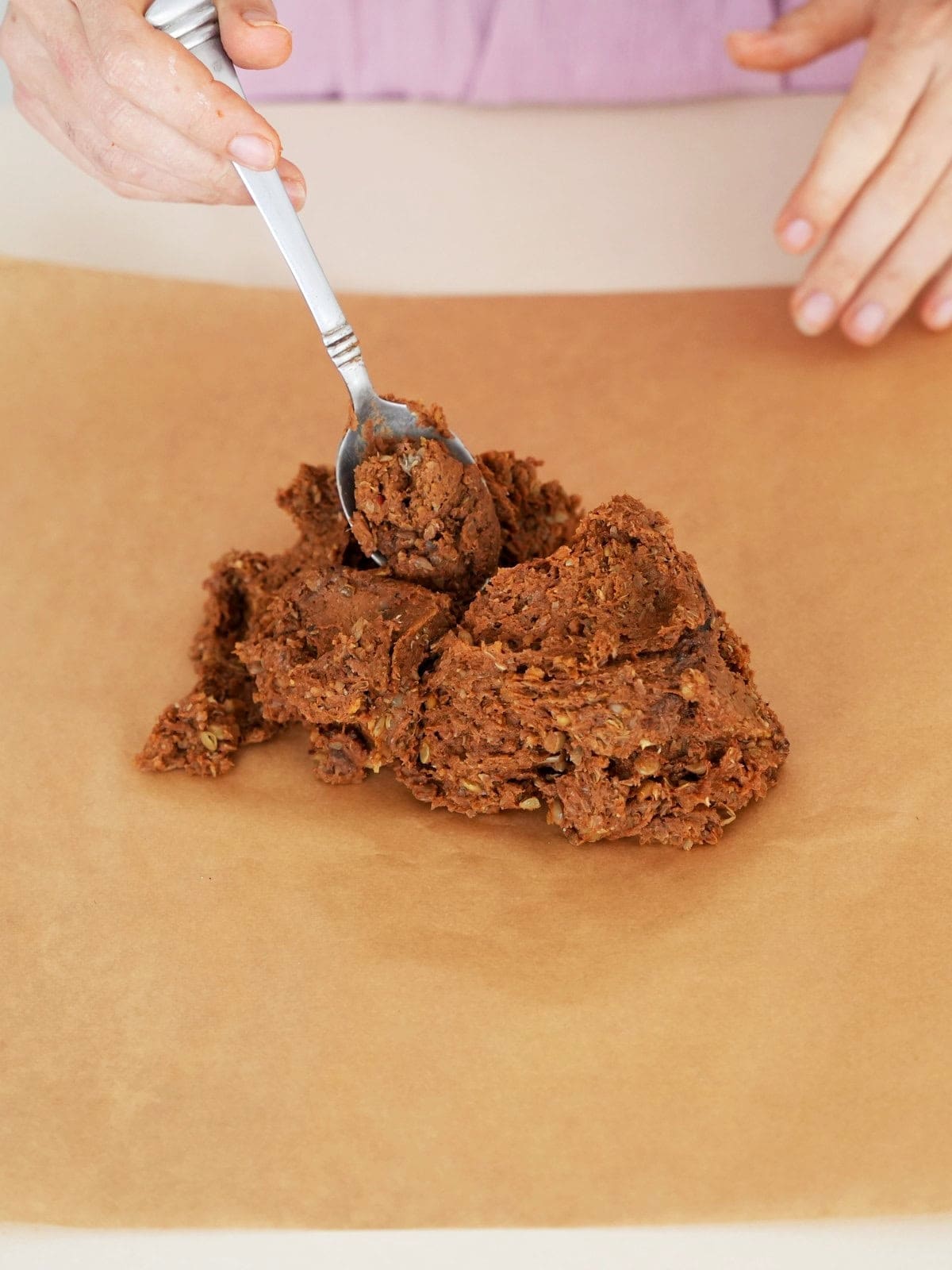 cooked lentil spice mixture on parchment paper