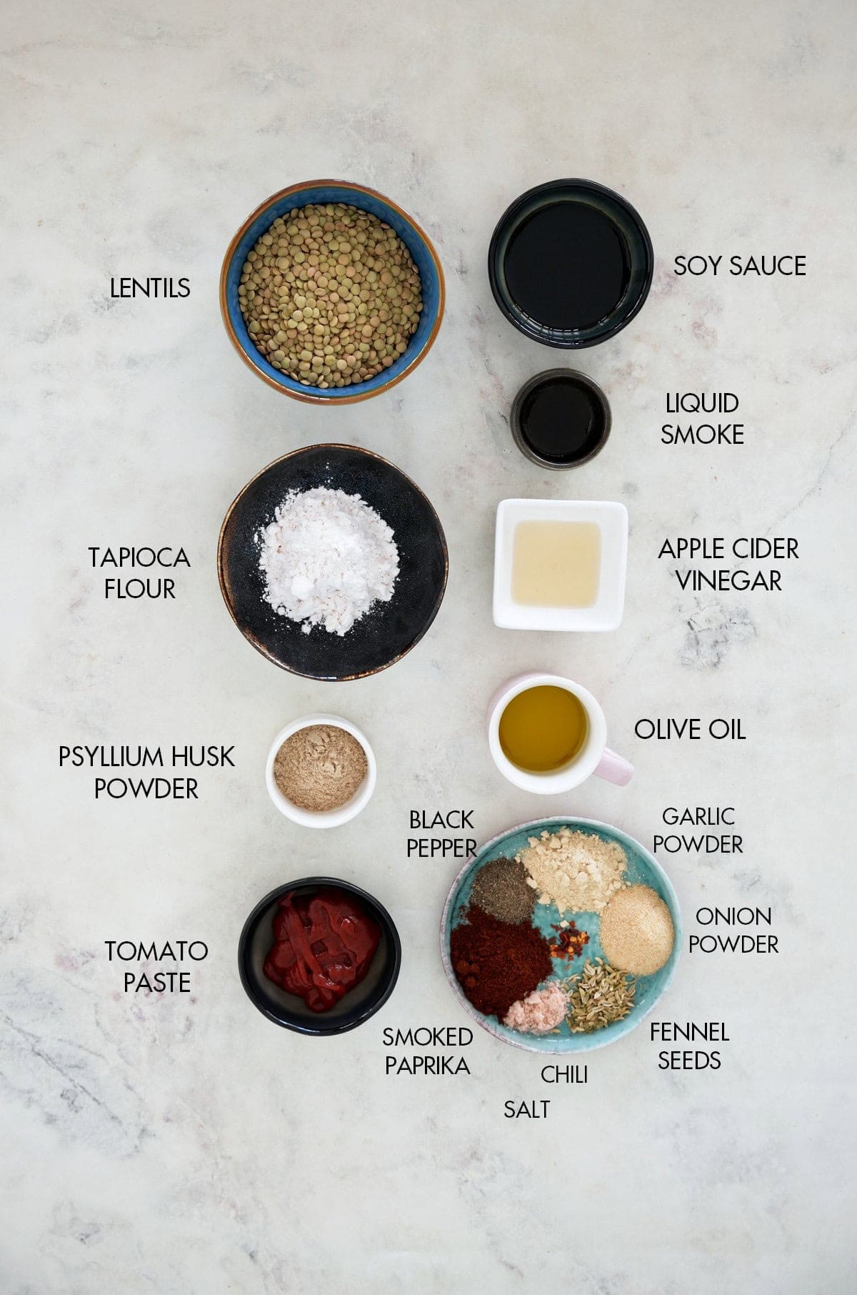 ingredients for vegan pepperoni in small dishes.